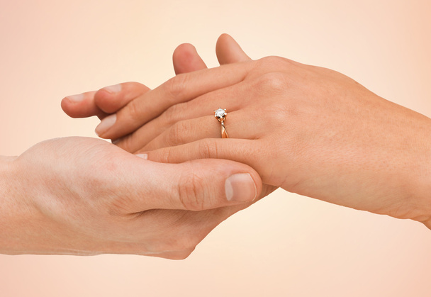 close up of man and woman hands with wedding ring - Foto, Imagem