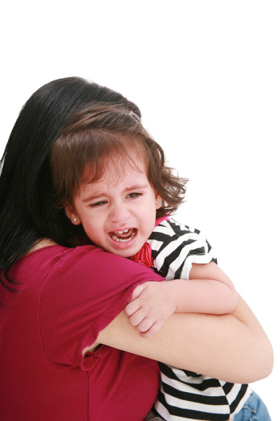 Little girl crying in mothers arm, isolated on white - Foto, afbeelding