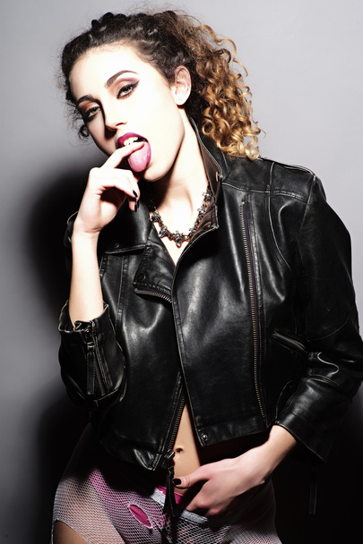 Fashionable young girl in leather jacket - Foto, immagini