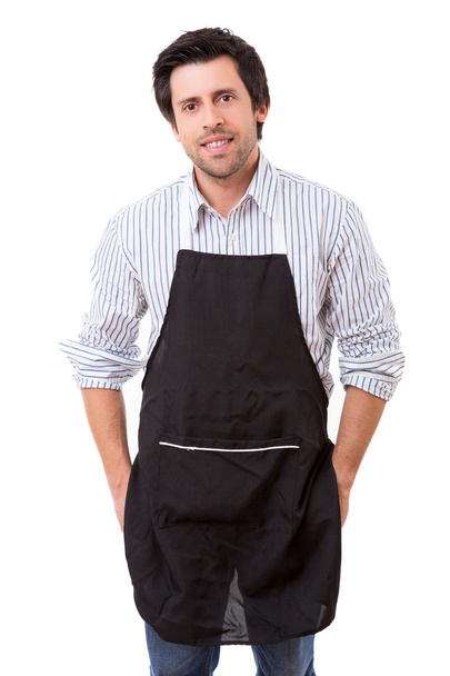 handsome young man with apron - Photo, Image