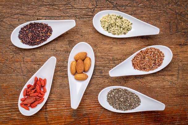Superfood obilí, semen, berry a ořechy abstrakt - Fotografie, Obrázek