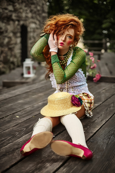 Fashion shot of woman in doll style. Creative make-up.Fantasy dress. - Foto, Imagen