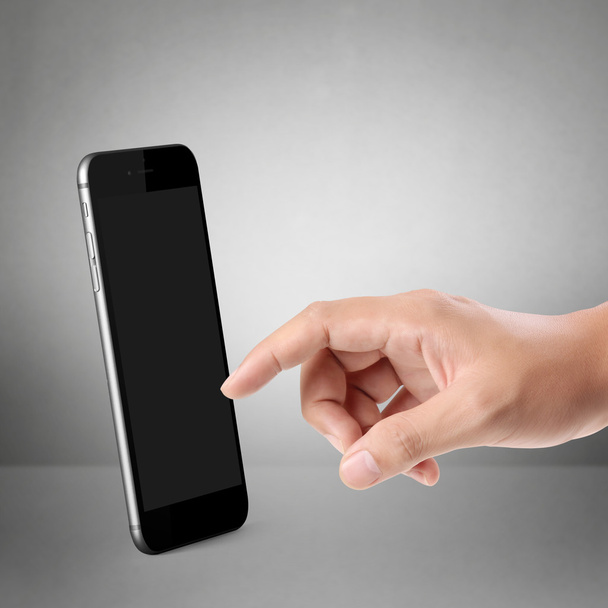 Teléfono móvil moderno en la mano
  - Foto, imagen