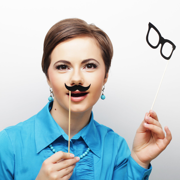 young woman holding mustache - Photo, image