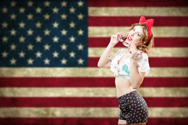 pretty lady with the USA flag - 写真・画像