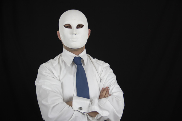 businessman in suit wearing mask, business power isolated on black background - Foto, immagini