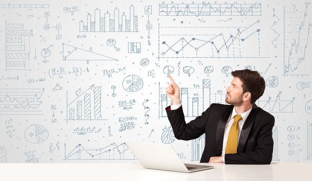 Businessman with diagram background - Photo, Image