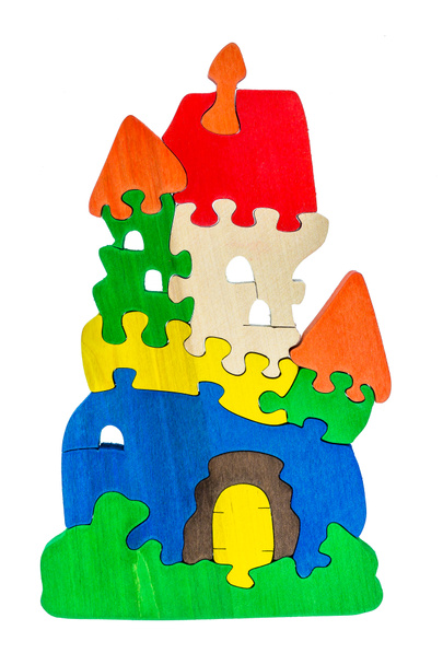 Красочные деревянные части головоломки в форме замка
 - Фото, изображение