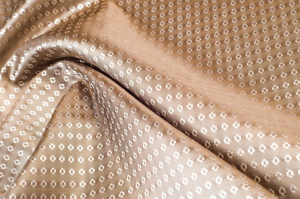 A textura do tecido de seda de bege com pequeno padrão branco
 - Foto, Imagem