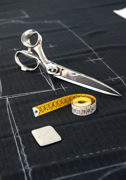 Scissors and Tape Measure on Fabric in Studio - Photo, Image