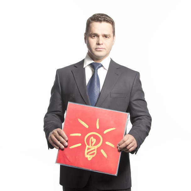 Man holding red plate in hands - Photo, image