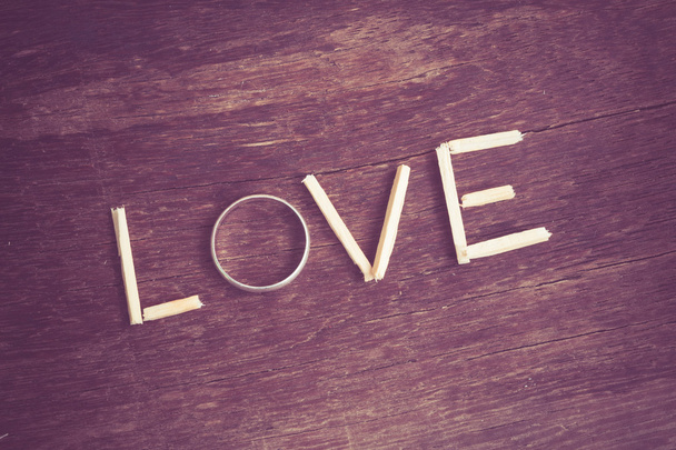  spelling  Love with ring and wood with filter effect retro vintage style - Foto, Imagen