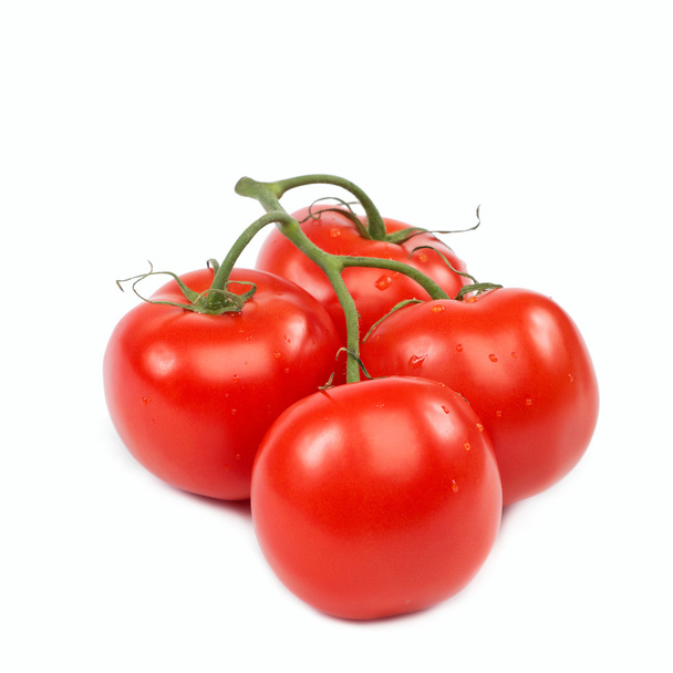 A branch of fresh tomatoes on white background. - Фото, зображення