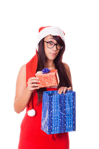 Woman with Santa Hat and Christmas Gift - Fotó, kép