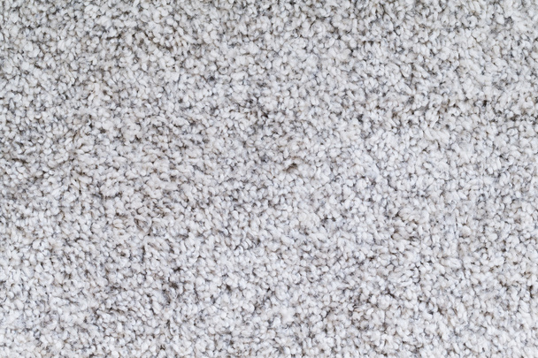grauer flauschiger Teppich - Foto, Bild