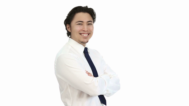 Mladý a pohledný podnikatel na sobě bílou košili s modrou kravatu - Záběry, video