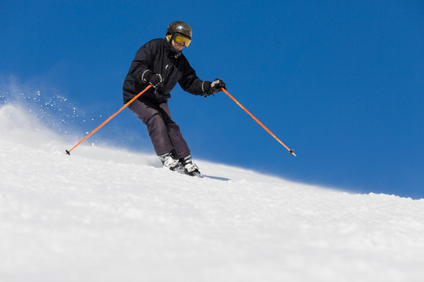 Male skier skiing at ski resort - Foto, Imagem