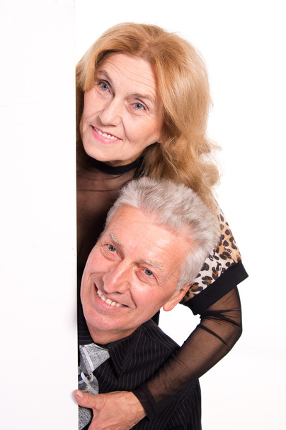 Old couple with board - Фото, зображення