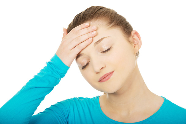 Teen woman with headache. - Zdjęcie, obraz