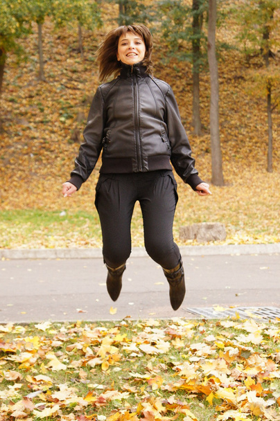 Pretty woman jumping - Фото, зображення