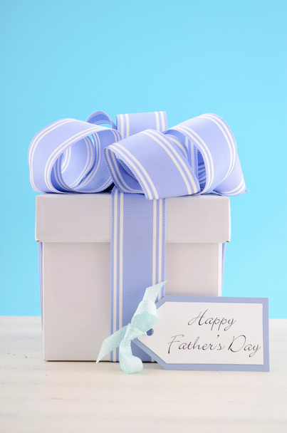 Happy Fathers Day Gift with Blue and White Ribbon - Photo, Image
