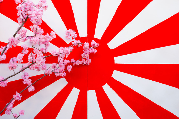Σημαία της Ιαπωνίας με σύνθεση sakura λουλούδι - Φωτογραφία, εικόνα