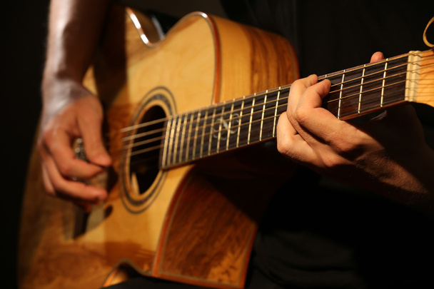 man playing guitar - Фото, изображение