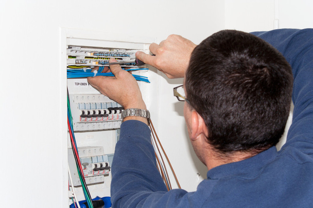 Electrician working on the involvement - Photo, Image