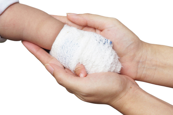 baby's hand with bandage - Photo, Image