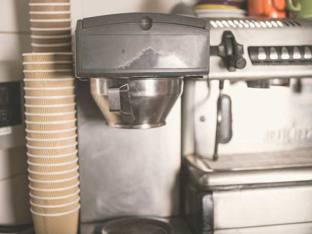 Coffee machine and paper cups - Фото, изображение