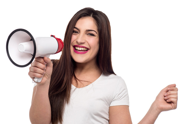 woman proclaiming over megaphone - Foto, Imagen