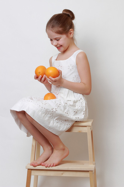 Kid holding eco orange - Zdjęcie, obraz