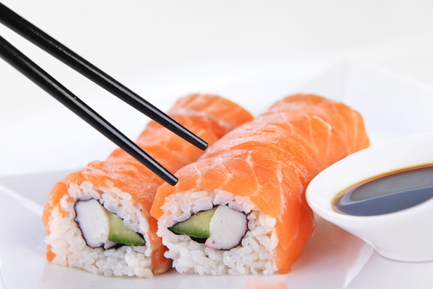 Sushi with salmon on plate - Photo, image