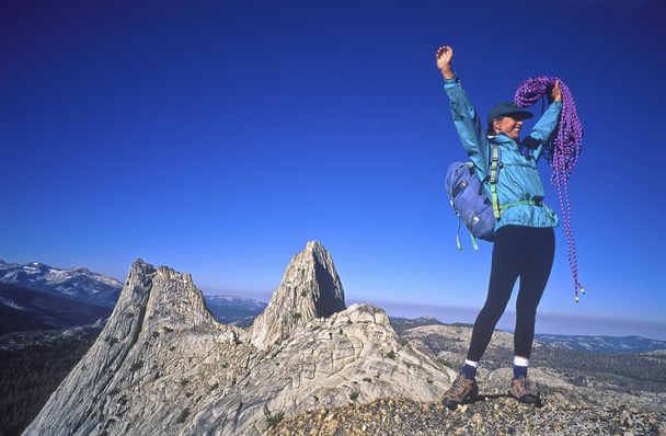 Female climber on the summit. - Photo, Image