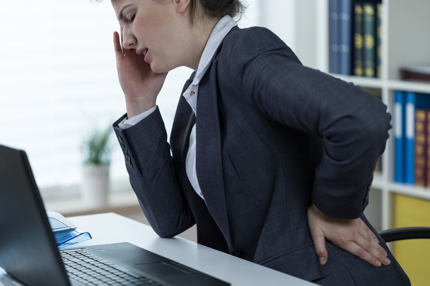 Problems with spine at office work - Foto, immagini