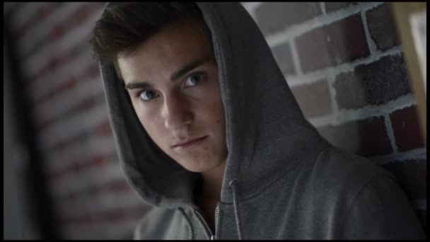 Teennager Boy in hooded top - Materiał filmowy, wideo