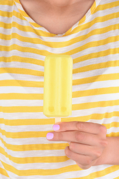 Woman Holding Lemon Ice Pop - Фото, зображення