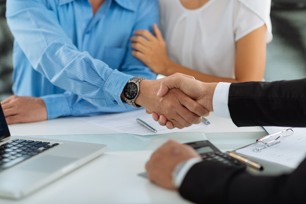 real estate agent shaking hands with client - Photo, Image
