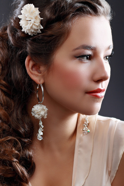 Beautiful  Woman with flower in hair - Zdjęcie, obraz