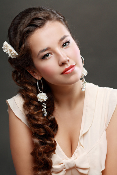 Beautiful  Woman with flower in hair - Foto, Bild