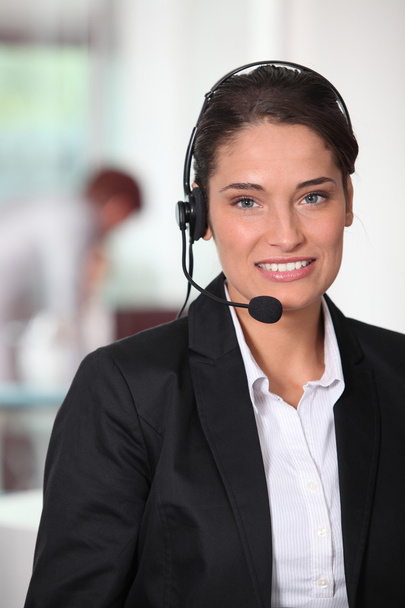Customer service woman smiling - Foto, afbeelding