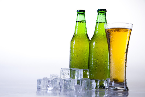 Beer bottle and glass - Photo, Image