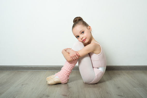 young ballerina does ballet poses - 写真・画像