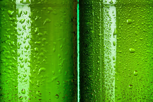 Wet green beer bottles abstract - Foto, afbeelding