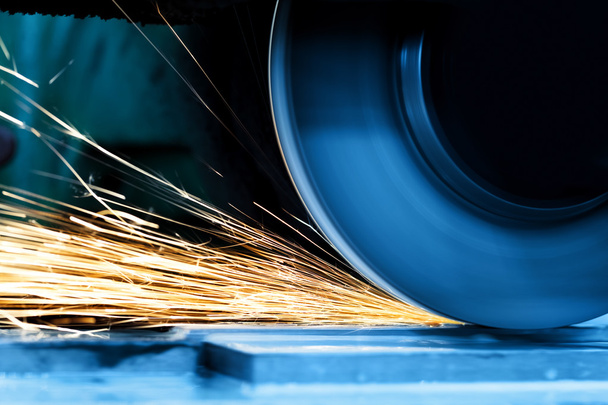 Sparks from grinding machine. - Photo, Image