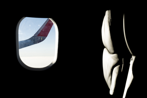 Assento de voo de asa e iluminado
 - Foto, Imagem