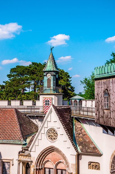 Clock tower and roofs of Franzensburg castle, Austria - Photo, Image