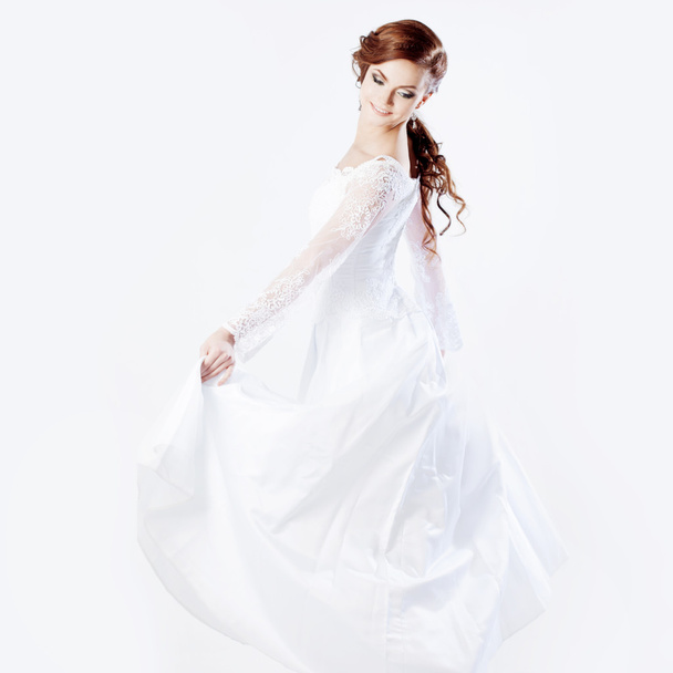 Beautiful bride in wedding dress, white background, square - Фото, зображення