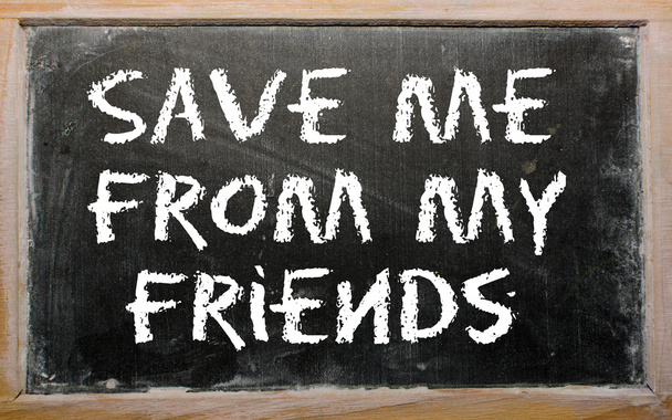 Пословица "Спаси меня от моих друзей" написана на доске
 - Фото, изображение