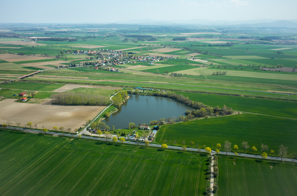 Вид с воздуха на маленькую деревню - Фото, изображение